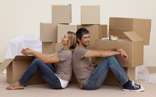 Efficient unpacking team setting up a new home in Ruislip
