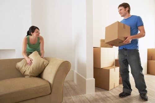 Removalists packing and loading items for a move